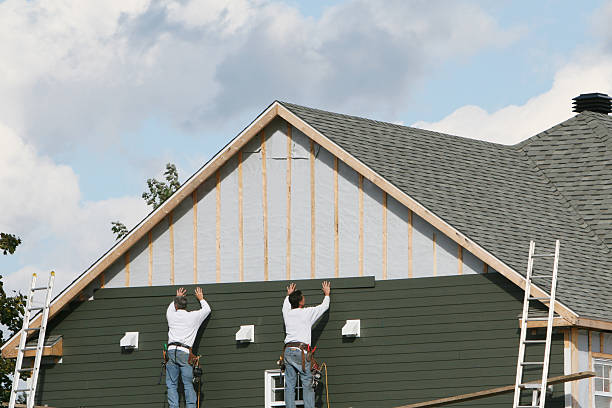 Professional Storm Damage Siding Repair technician working in Larkspur, CO